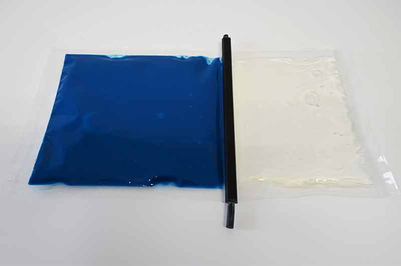 Blue HP89-7 with transparent hardener in a double chamber bag; separated by a dividing rail.