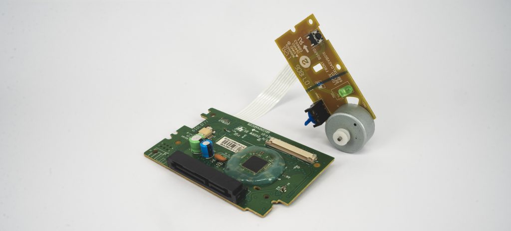 Green circuit board with ISO-CAST BRW-T and BRW-N (DAM and FILL) connected to a yellowish circuit board.